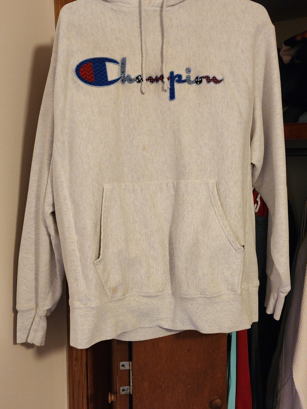 Champion Menβs Heather Light Gray Hoodie with Embroidered Logo